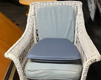 Wicker chair and antique furniture