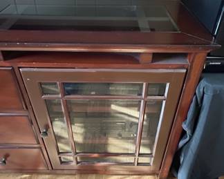 Traditional Media Console with Glass Doors and Drawers third image