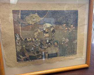 The artwork is a hand-colored or print illustration titled "Mad Hatters Tea Party" depicting a scene from Alice in Wonderland, signed in the lower right by Viola F. Gourley