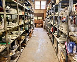 Rows and rows of treasures, trinkets, glassware, and decor
