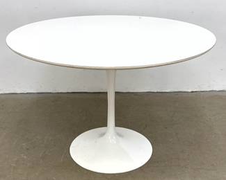 Lot 620 Mid Century Modern Eero Saarinen Round White Laminate and Plywood Tulip Pedestal Dining Table. Attri