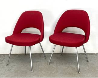 Lot 519 Pair of Executive side chairs designed by Eero Saarinen for Knoll.