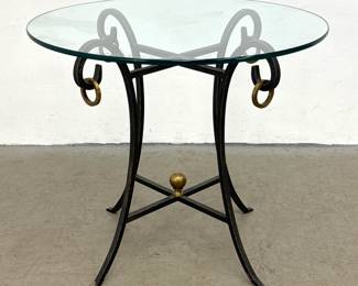 Lot 278 Black Iron, Brass Mounted Side Table. Round Glass Top. Modernist. Brass Ring Accents and Finial. 