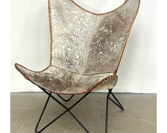 Lot 630 MidCentury Modern Butterfly Chair with Silver Acid Wash Cowhide Sling and Black Iron Frame. Unsigne