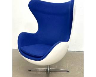 Lot 621 Contemporary Modern Swivel Lounge Egg Chair. Swivel egg chair with white fiberglass shell and blue w