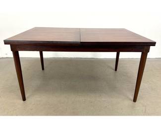Lot 518 Danish Modern Rosewood Extendable Dining Table with flip open extensions.
