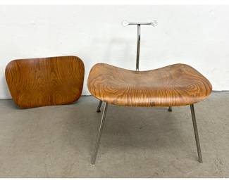 Lot 431 Eames LCM chair. Wood refinished. Back missing rubber stops. 