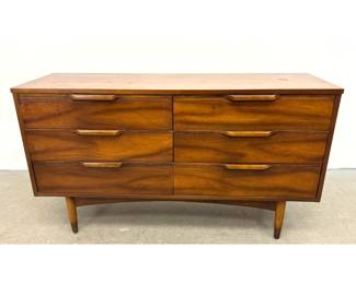 Lot 339 MidCentury Modern 6 drawer Walnut Dresser with sculpted wood pulls and tapered legs. 