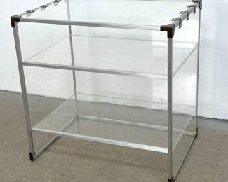 Lot 384 Contemporary 3 Tier Clear Acrylic and Aluminum Shelving Display Unit. Dark Brass Hardware and Corner