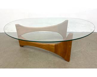 Lot 368 Contemporary wood and Glass Coffee Table After a Pearsall Design. 