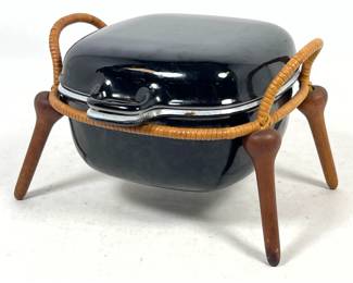 Lot 78 Danish Modern Jens Quistgaard AnkerLine Black Enameled Cast Iron Sauce Pan w Rattan Stand