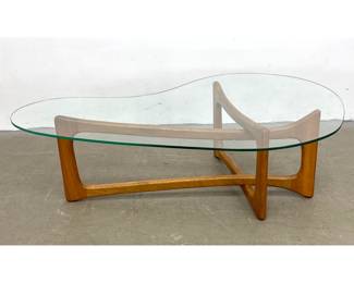 Lot 632 Contemporary wood and Glass Coffee Table After a Pearsall Design. 