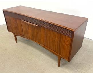 Lot 224 Mid Century Modern Bow front Sideboard Credenza. Reeded Trim and Drop Down Bar Cabinet. Tapered Legs