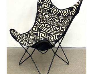 Lot 402 Butterfly Chair Black Ivory Aztec Print Cover. Black Steel Frame, in the style of Hardoy BKF Chair