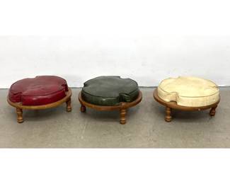 Lot 305 3pc set of mid century modern round stacking footstools with multi color vinyl upholstery and turned