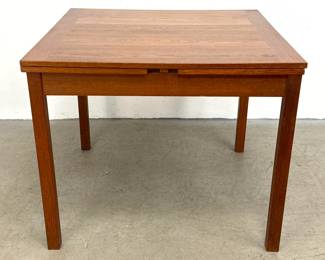 Lot 257 Danish Modern teak draw leaf dining table with square top and square profile legs marked Made in Den
