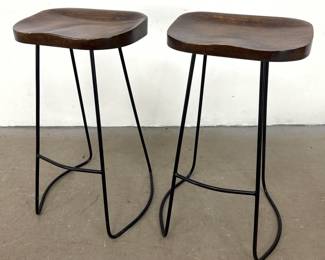 Lot 418 Pair of Contemporary Industrial Style Saddle Seat Bar Stools with Black Iron Frames