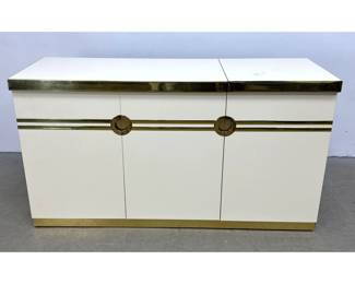 Lot 307 Pierre Cardin Modernist white laminate and brass trim dry bar credenza with flip top and removable i
