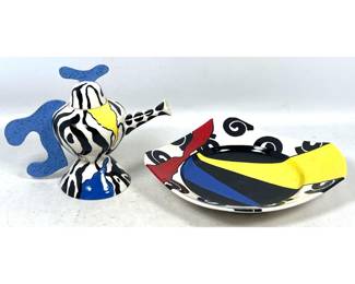Lot 46 Two piece contemporary ceramic teapot and bowl with bold polychrome Memphis style patterns. 