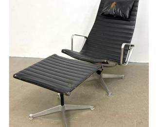 Lot 520 Vintage Herman Miller Eames Aluminum Group Lounge Chair and Ottoman with 4 Star Swivel Base and Ribb