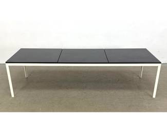 Lot 111 Architectural Florence Knoll TAngle table bench featuring a crisp white enameled steel frame and se