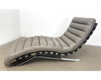 Lot 407 Modernist Steel Framed Wave Lounge Chair in Gray Leather. 