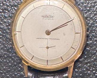 18k case 1950’s men’s watch with croc strap.