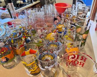 Approximately 25 vintage promotional glasses