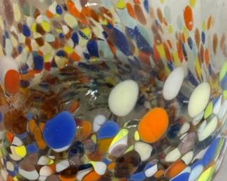 Close up of confetti glass vase