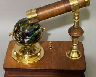 Musical kaleidoscope with an art glass sphere