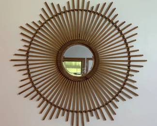 Large boho-style wooden sunburst mirror