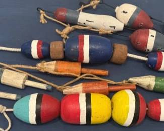 Painted wooden pot buoys and fishing floats for decor