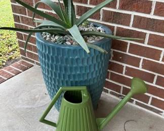 Several large ceramic planters are available, some including live plants