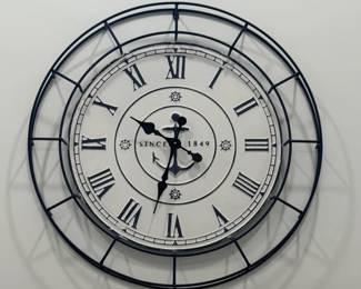 Metal nautical-motif wall clock