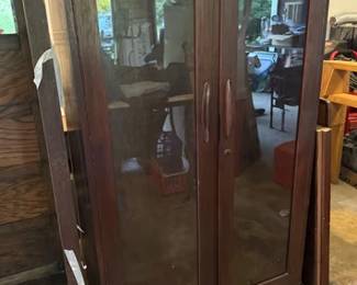 Antique wood and glass bookcase with three shelves