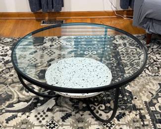 Marisol round terrazzo cocktail table by Crestview Collections, area rug
