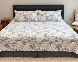 King tufted headboard, metal frame, mattress and Tommy Bahama bedding