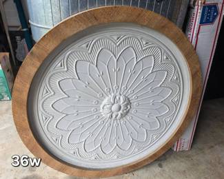 Large wood framed metal medallion