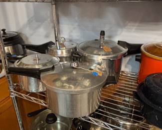 Several Pressure Cookers and pots