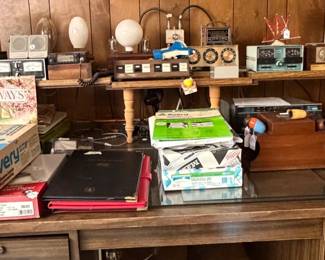 Desk loaded with C.B items ,office  items