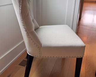 Set of 8 Arhaus Upholstered Tufted Back Dining Chairs. Some Have Stains. Each Measures 22” W x 26” D with 19” Seat Height. Photo 3 of 8.