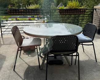 Outdoor Glass Top Pedestal Dining Table and 4 Chair Set.