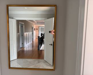 Gilt Metal Wall Mirror. Measures 36” x 48”. Photo 1 of 3.