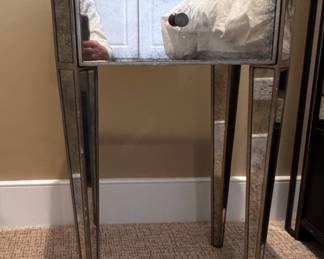 Smoked Mirrored Glass Side Table. Measures 17” W x 13” D x 25” H. Photo 1 of 3.