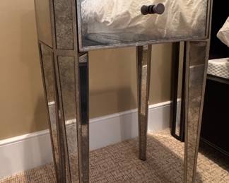 Smoked Mirrored Glass Side Table. Measures 17” W x 13” D x 25” H. Photo 2 of 3