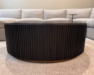 Arhaus Finnley Marble Top Coffee Table with Fluted Wood Tambour Base. Measures 42” D x 15” H. Photo 1 of 2.