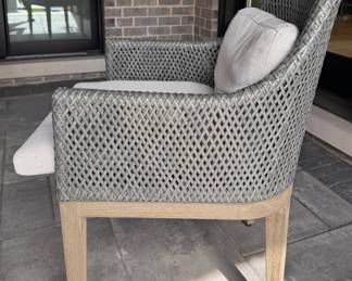 Concrete Top Dining with Oak Pedestal Base. Table Measures 60" D with 29” Clearance. Set of 6 Wall Weather Woven Dining Chairs. Photo 4 of 5