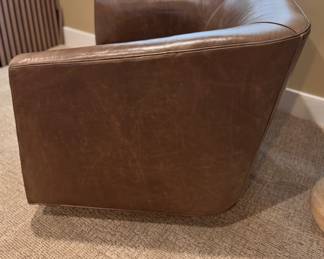Brown Leather Swivel Barrel Back Armchair. Measures 31” W x 33” D. Photo 2 of 3.
