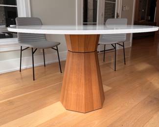 Room & Board Glover Pedestal Dining Table with White Quartz Top. Measures 48” D x 29.5” H with 28.5” Clearance. Photo 1 of 2.