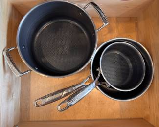 Henckels Stainless Steel Cookware: 1.3, 3.1 Saucepans with Lids and 5.8 Pot with Lid.